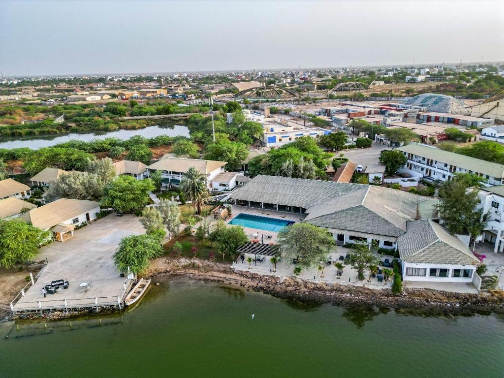 an aerial view of a house on the water at Le Relais de Kaolack in Kaolack