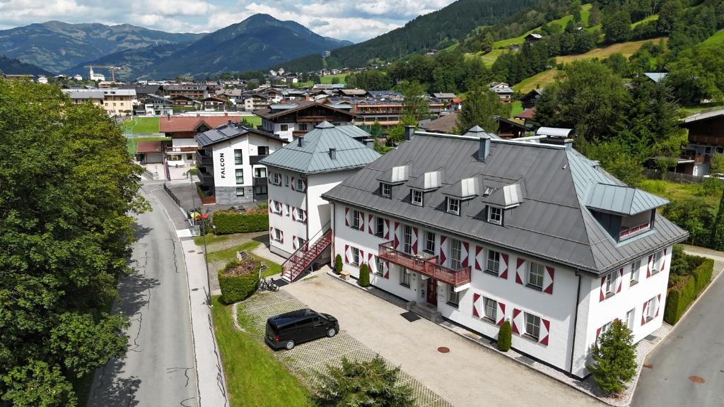 an aerial view of a large white house with a black roof at Kitz Residenz Twelve by All in One Apartments in Winklerdörfl