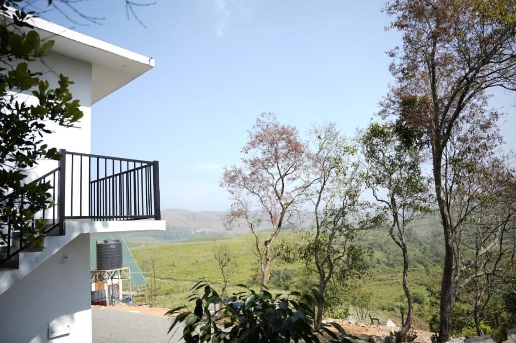 a view from the balcony of a house at Vagamon leafhill mountain view holidays in Vagamon