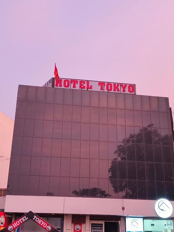 a hotel tokyo sign on top of a building at Hotel Tokyo in Bathinda