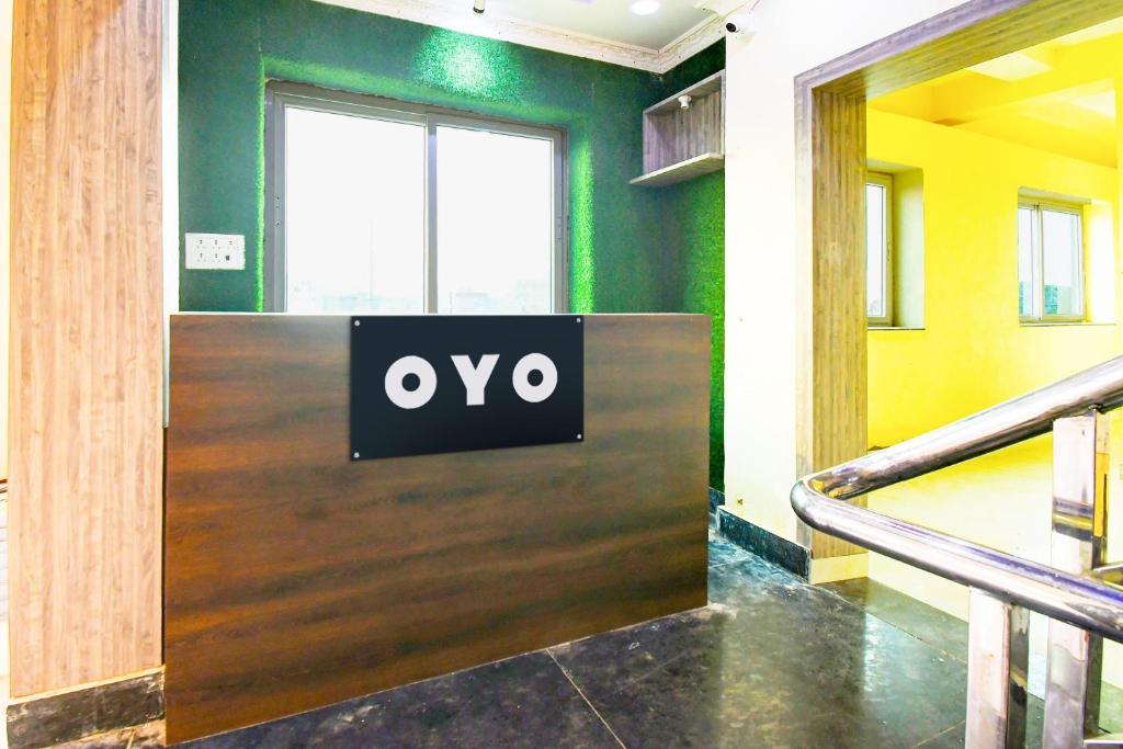 an office door with the ovo sign on it at Hotel O Grand 55 in Bālianta