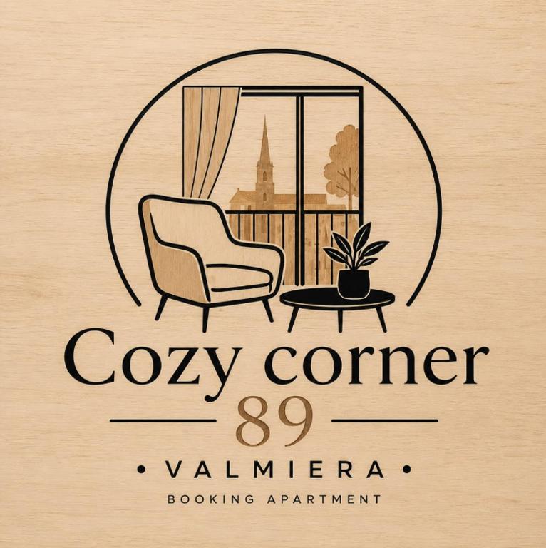 a sign with a chair and a table and a window at Cozy corner89, private parking in Valmiera