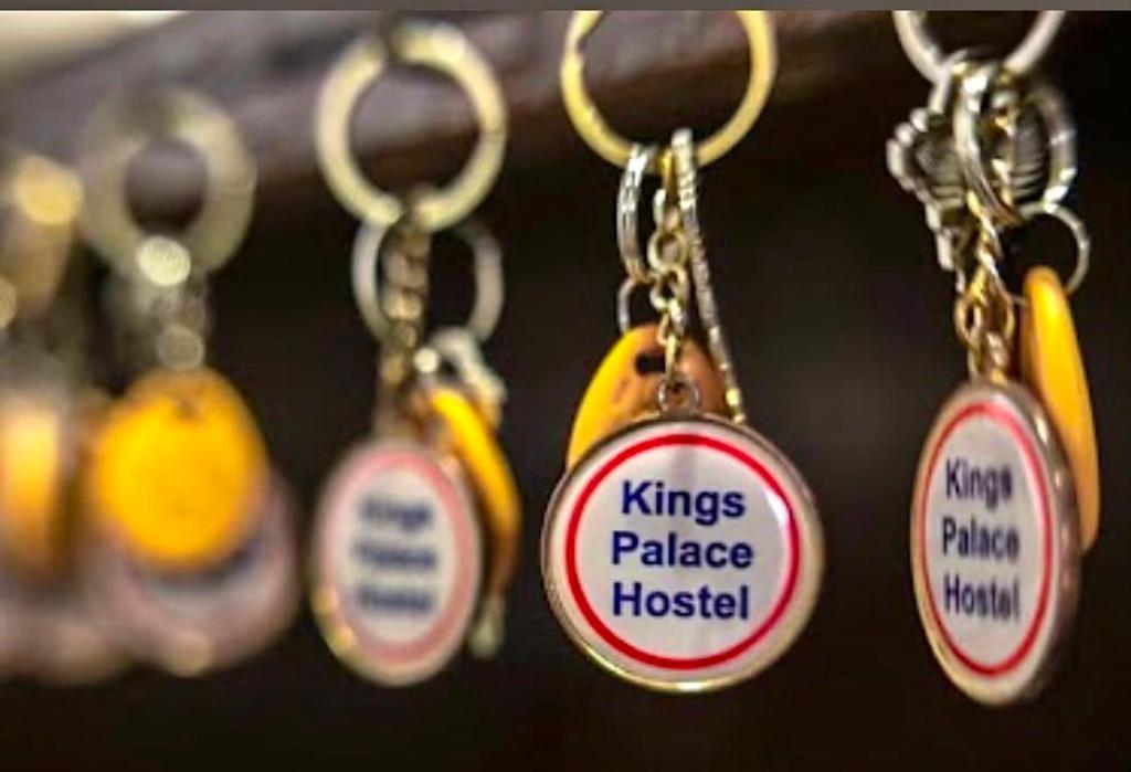 a group of key chains with phrases on them at Kings palace castle in Cairo