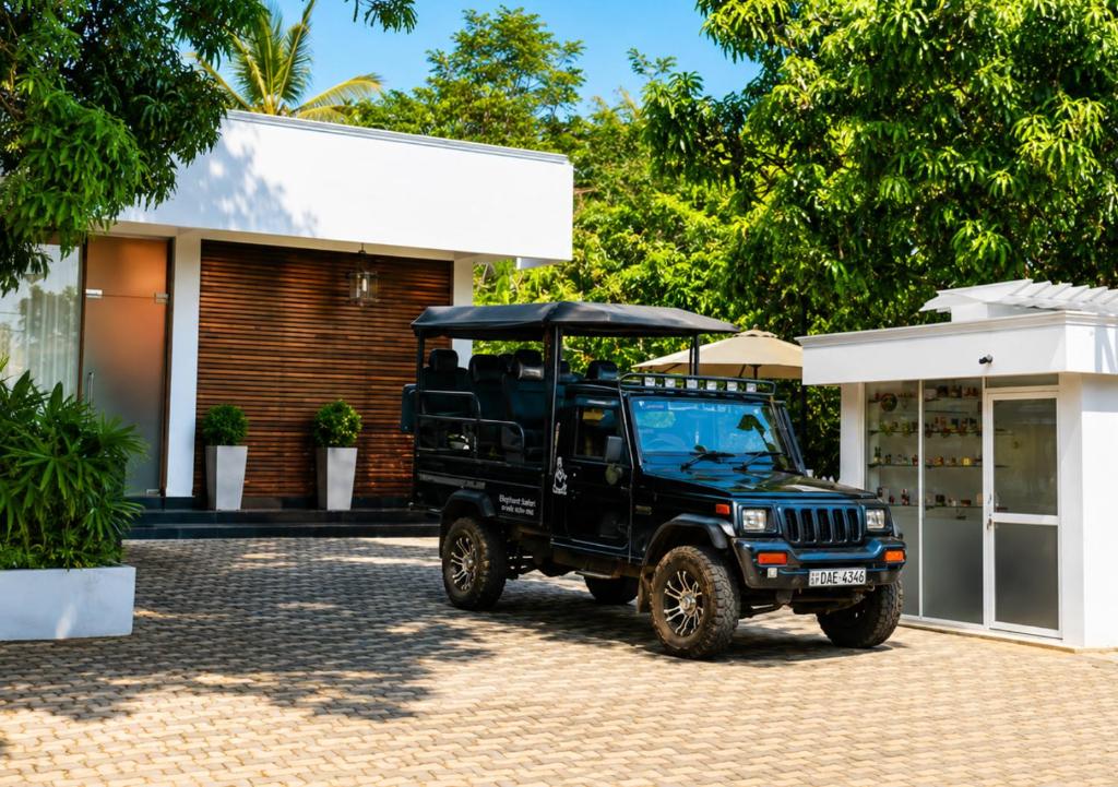 a jeep parked in front of a building at elephant park family bungalow in Colombage-ara