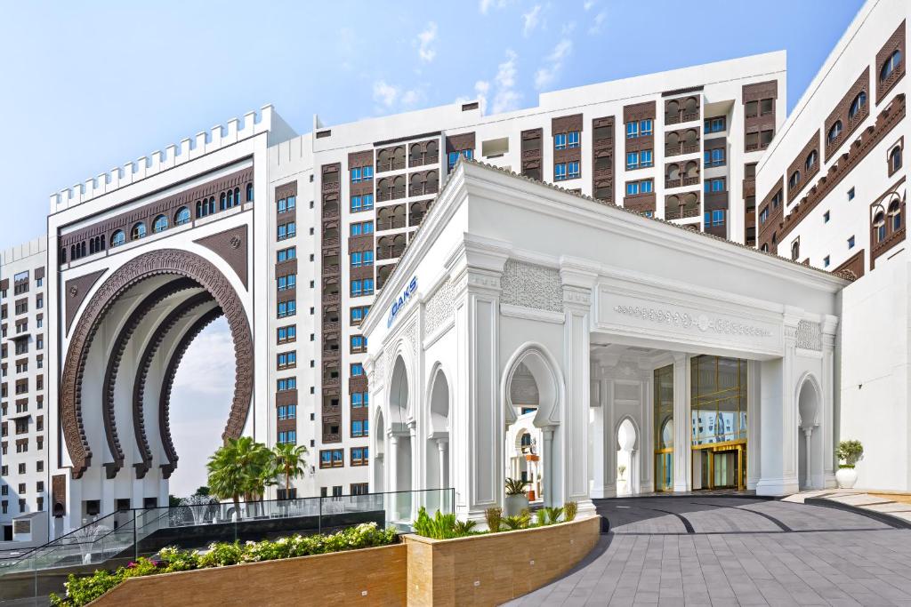an architectural rendering of a building with an arch at Oaks Ibn Battuta Gate Dubai in Dubai