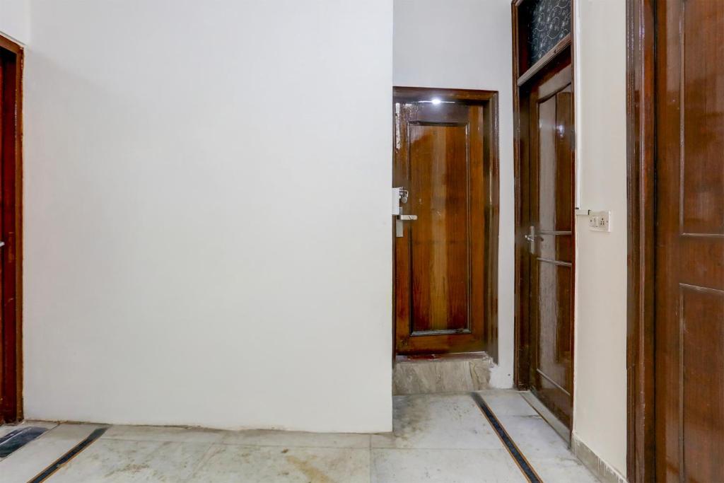 an open door of a room with a hallway at Hotel O Green Park Residency 2 in New Delhi