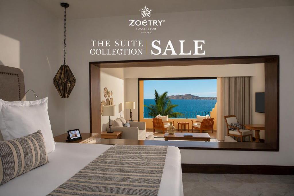 a hotel room with a bed and a sale sign at Zoetry Casa del Mar Los Cabos in El Bedito