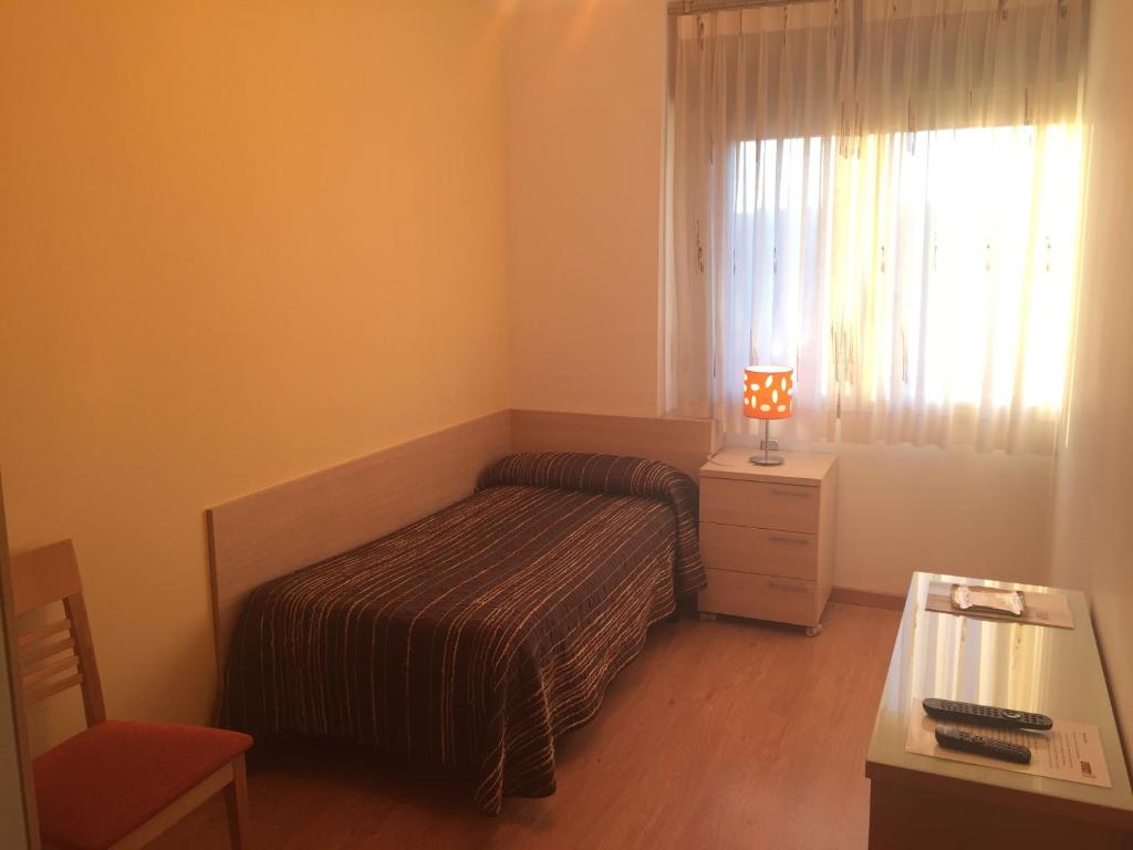 Postel nebo postele na pokoji v ubytování Altejo
