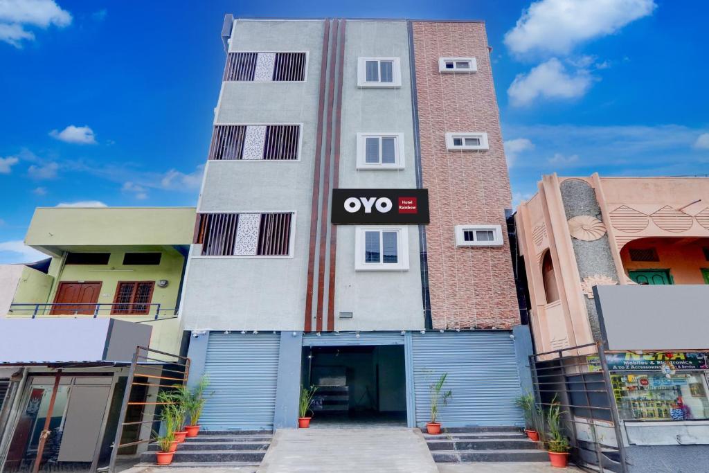 a building with a sign that says oxo on it at Hotel O Rainbow in Warangal