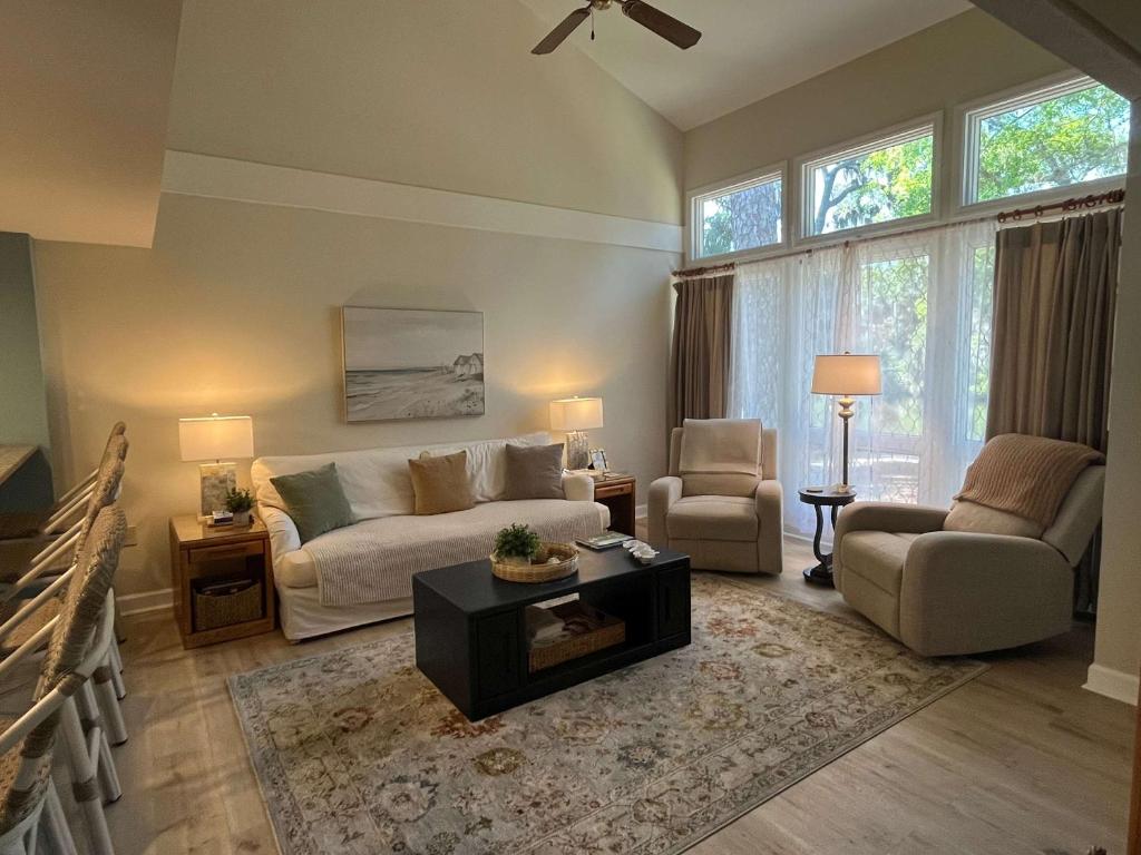 a living room with a couch and a table at Egrets Pointe, Unit 492 in Edisto Island