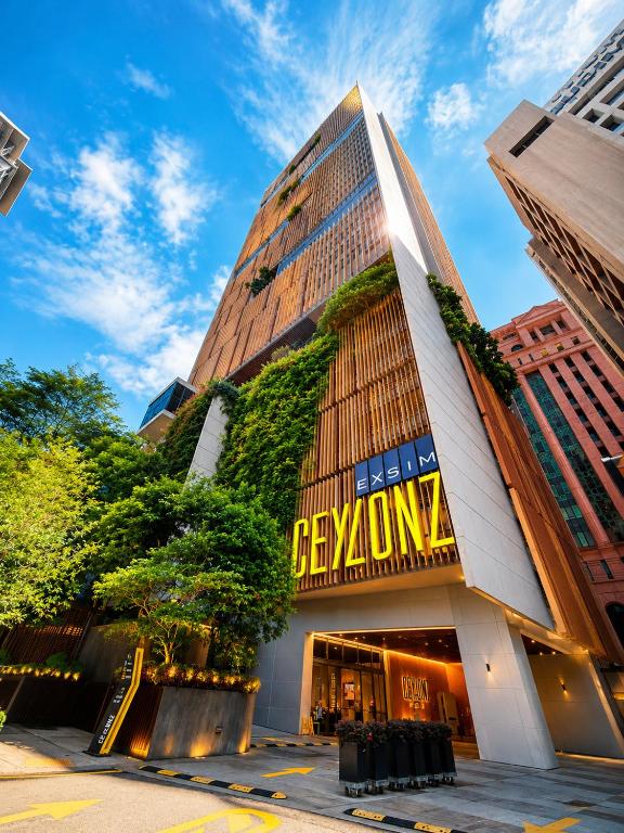 a building with a sign on the side of it at Ceylonz Suites KLCC By KL Tower in Kuala Lumpur