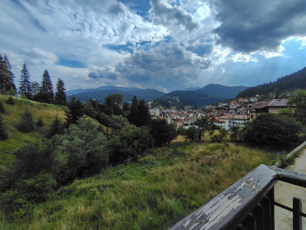 a view of a city from a hill at Апартамент за гости Александър in Chepelare