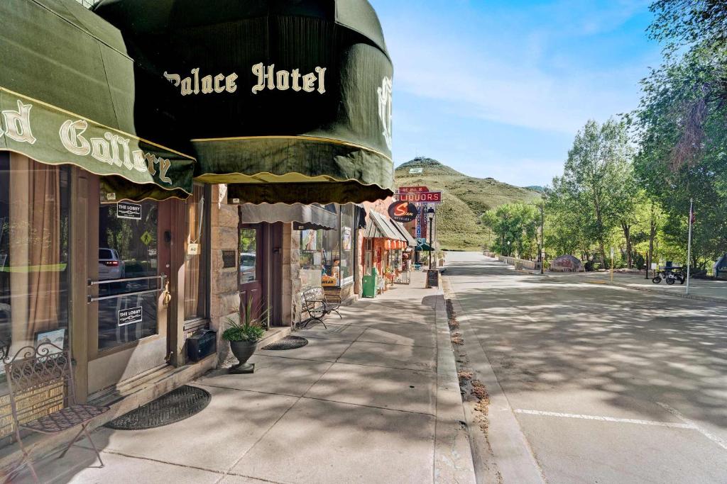 an empty street in a town with a hotel at Downtown Palace Hotel Suite - Steps to Adventure in Salida