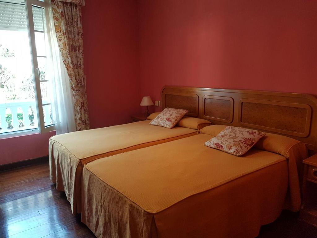 Cama o camas de una habitación en Alojamiento Calzada Romana