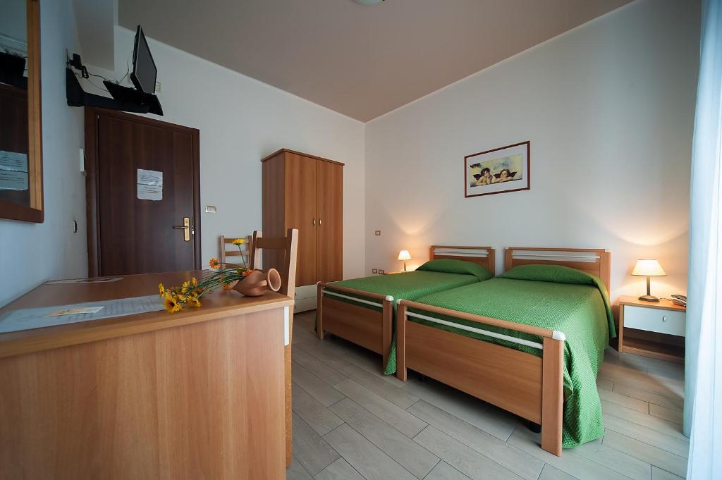 Posteľ alebo postele v izbe v ubytovaní Le Giare B&B