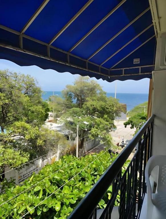 a balcony with a view of the ocean at Villa Hercilia - Rodadero in Rodadero