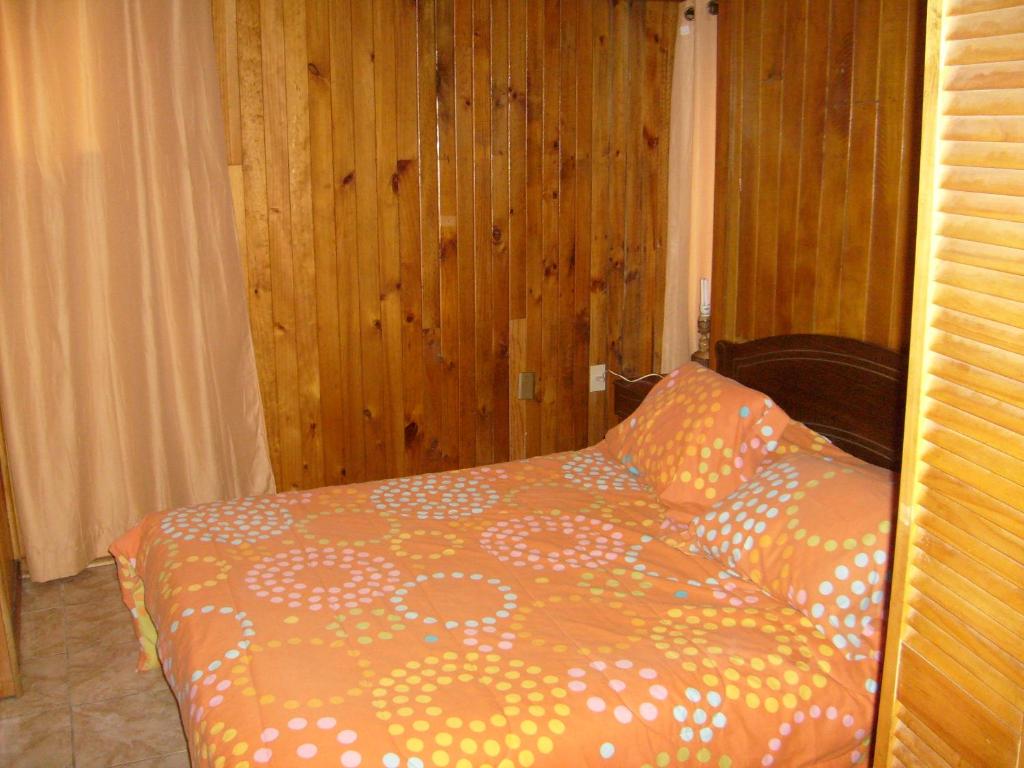 Letto o letti in una camera di Cabañas Los Castaños