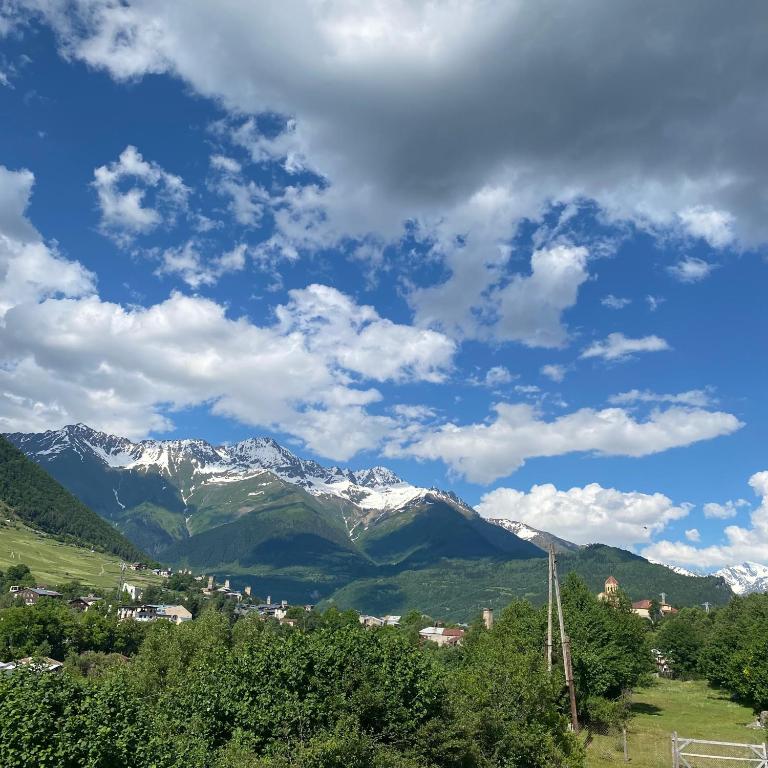 a view of a mountain range with snow at guesthouse NENO in Mestia