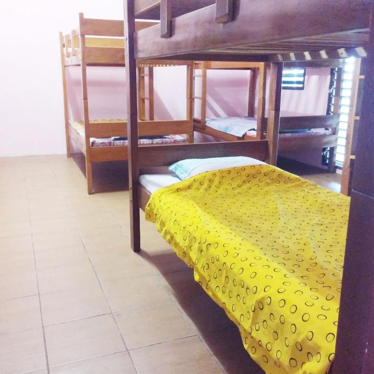 Postel nebo postele na pokoji v ubytování Bluepango Guest House