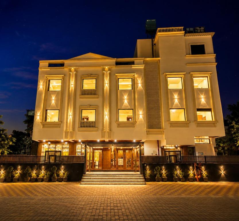a large white building at night at Mertiya Residency in Jodhpur