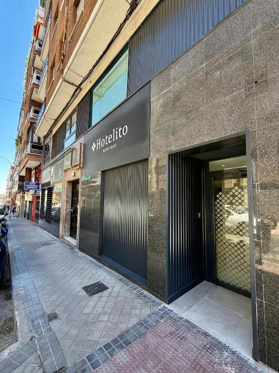 a storefront of a store on a city street at Hotelito Boutique Madrid Auditorio in Madrid