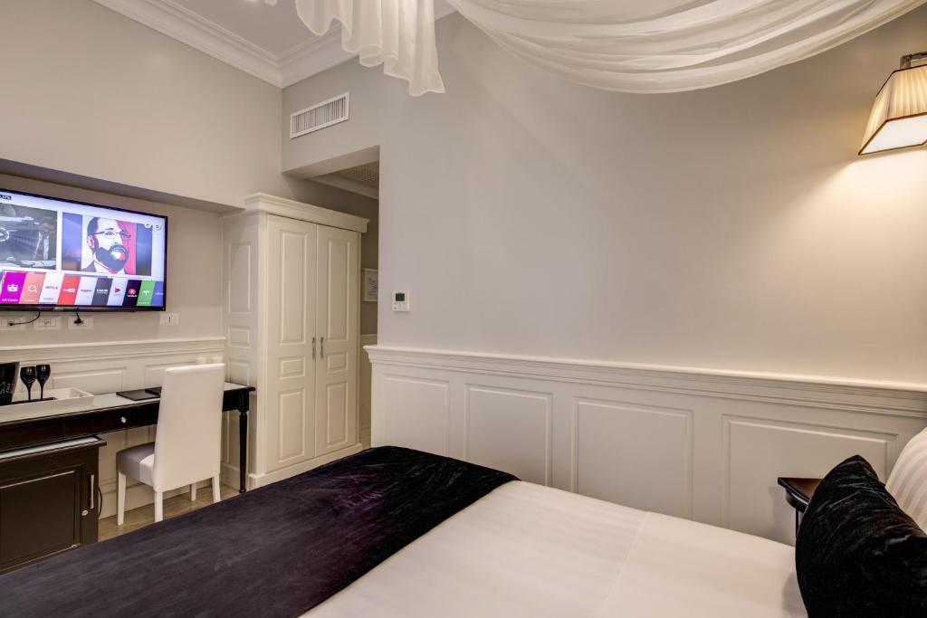 TV a/nebo společenská místnost v ubytování Hotel Tito