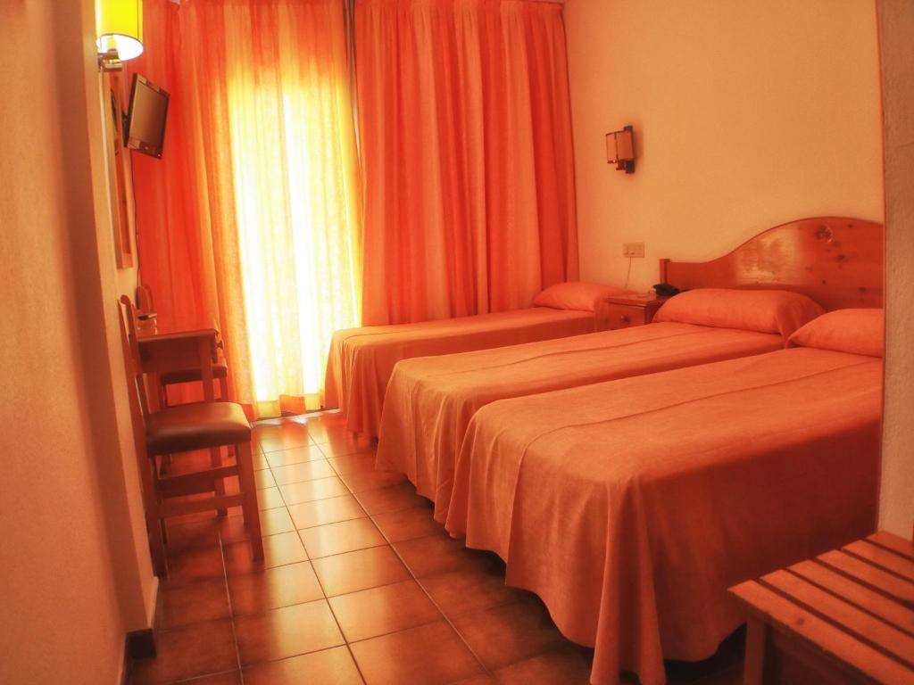 Postel nebo postele na pokoji v ubytování Hotel Parc