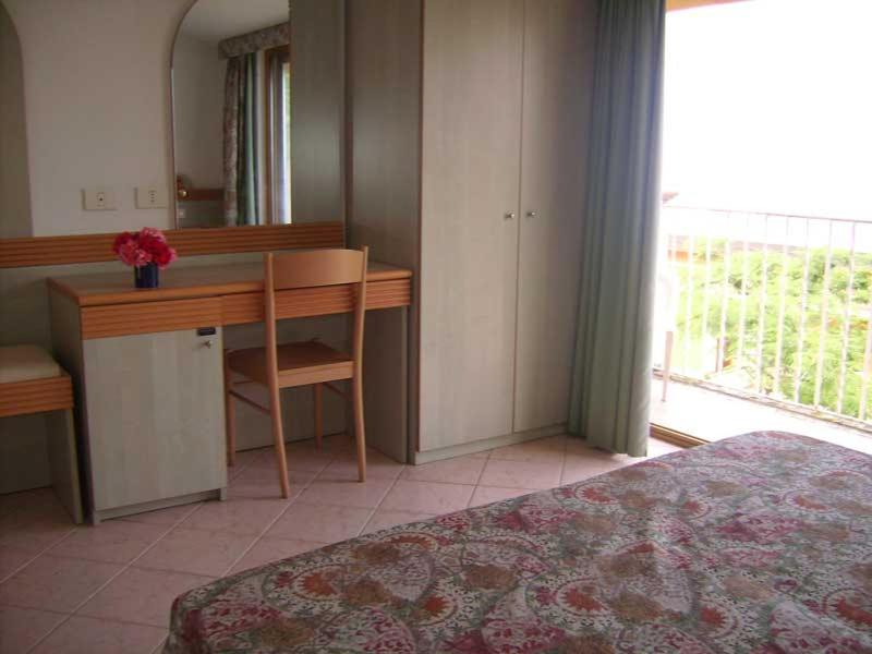 Postel nebo postele na pokoji v ubytování Cala Petrosa Resort