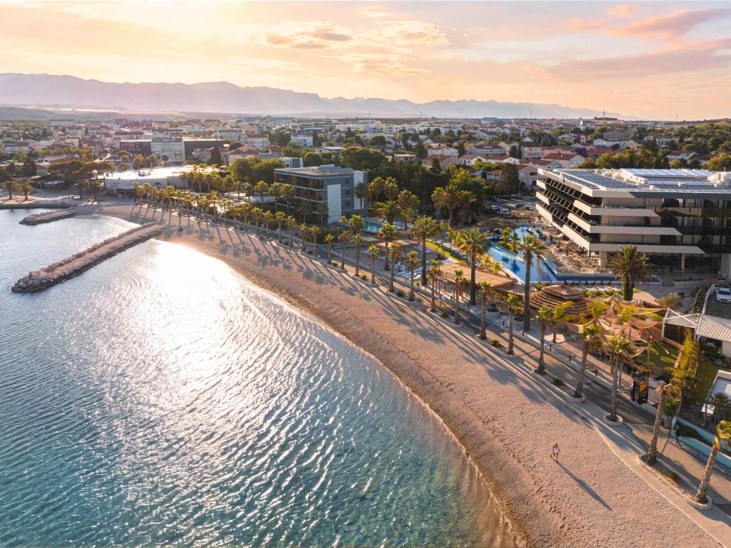 an aerial view of a beach and buildings at Liberty S Hotel in Novalja