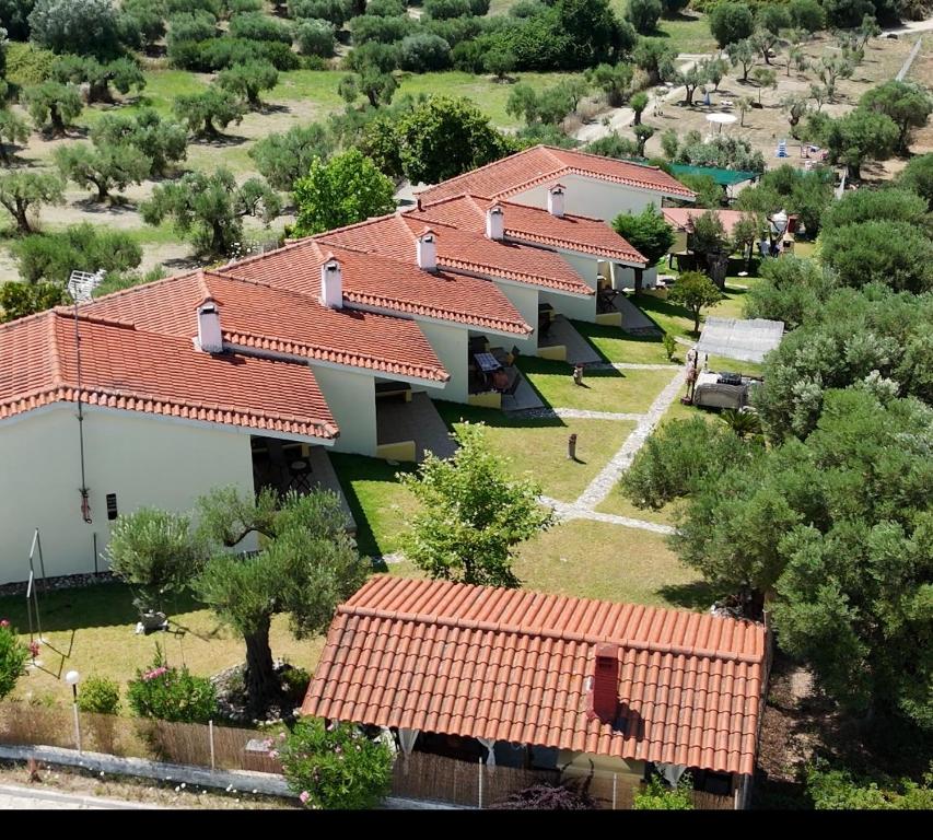 an overhead view of a row of houses with red roofs at Studio Dalkidi Kalandra Possidi in Kalandra