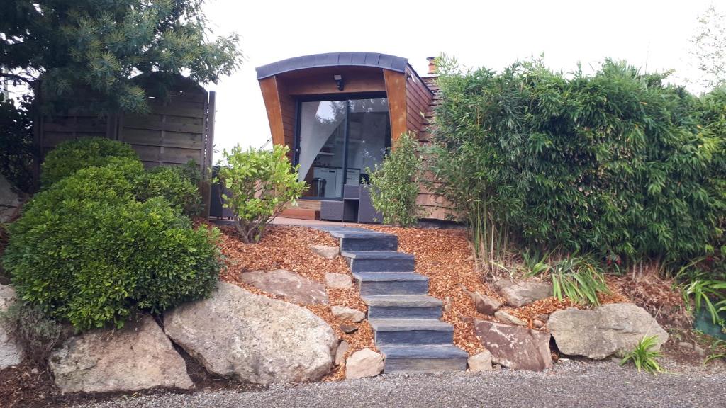 a set of stairs leading to a house at Les Dômes Du Ponant in Plouguerneau