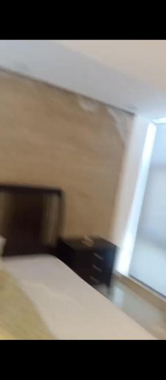 a blurry picture of a bed looking out a window at دوار الهلال دوار الثقافه in Irbid