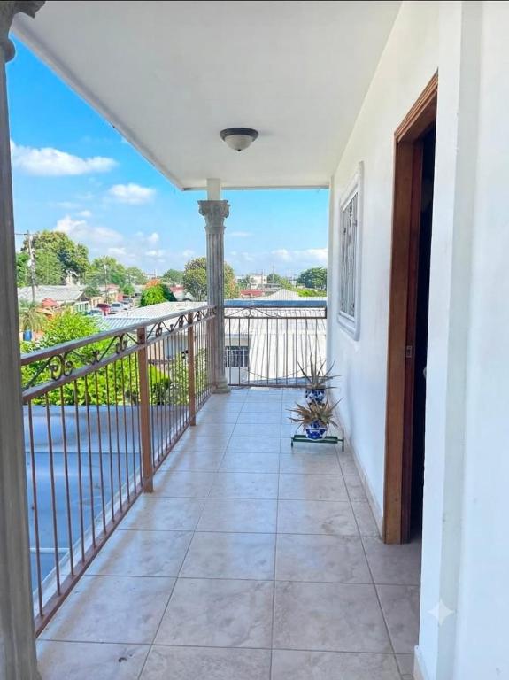 a balcony with a view of the water at Gasakam in San Pedro Sula