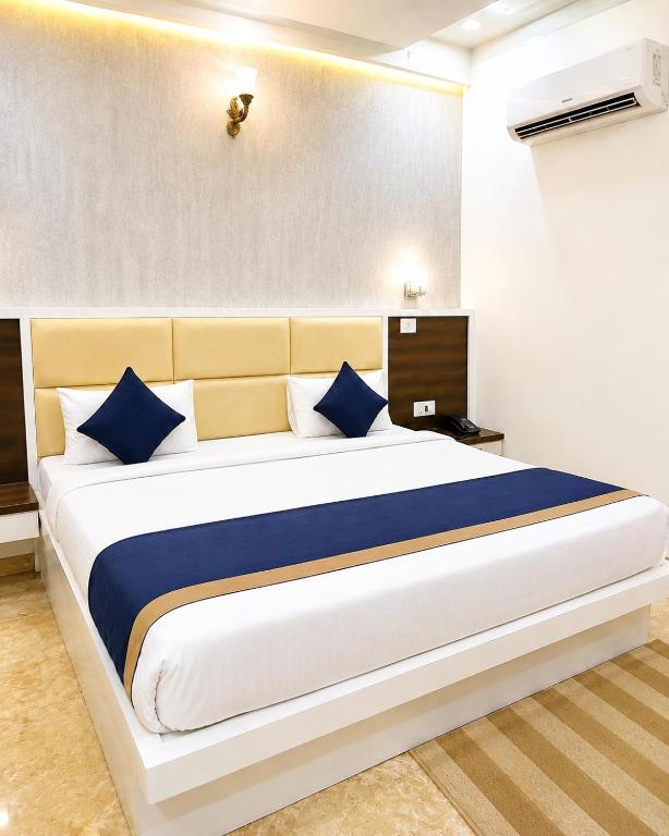 Llit o llits en una habitació de Hotel Urban Stay - By Silver Hospitality