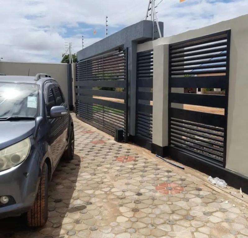 a car parked in front of a building at Migzhome in Dodoma