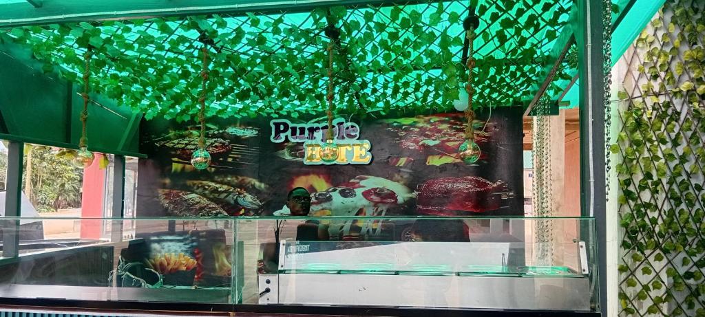 a store window with a buffet sign on it at Mr smith hotel in Oyarifa