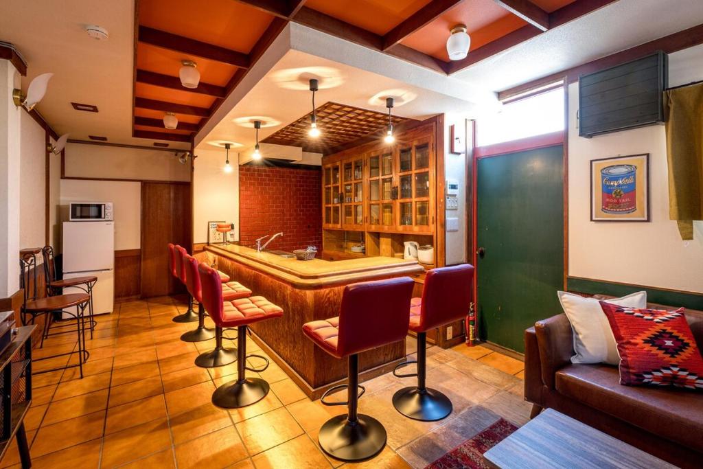 Retro-style coffee house and guesthouse-3 floors-Entire building available for rent-suitable for 9 people-Parking available-pets allowed-Mahjong