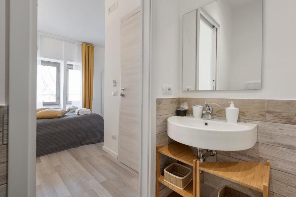 A bed or beds in a room at De Guestibus