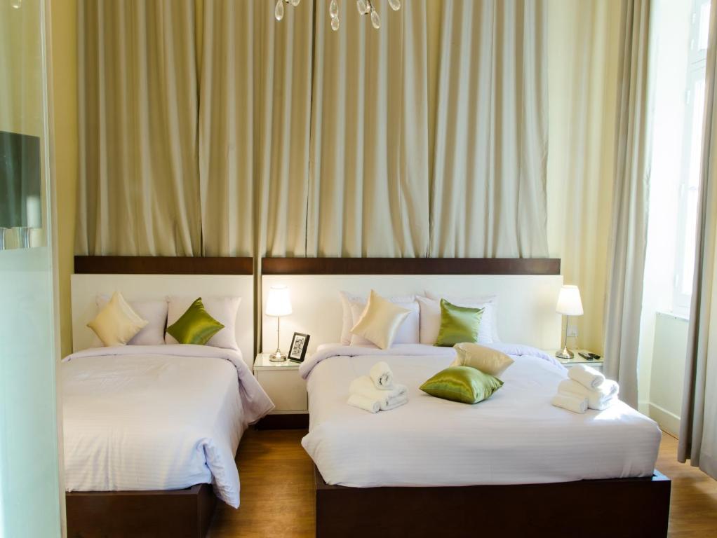 Postel nebo postele na pokoji v ubytování Grand Agor Hotel Cairo