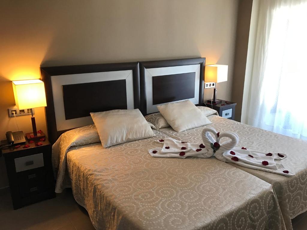 Postel nebo postele na pokoji v ubytování Hotel Rural Real de Poqueira