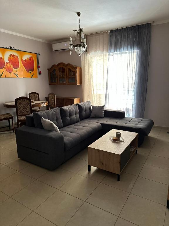a living room with a couch and a coffee table at Artistic Retreat in Nafplio