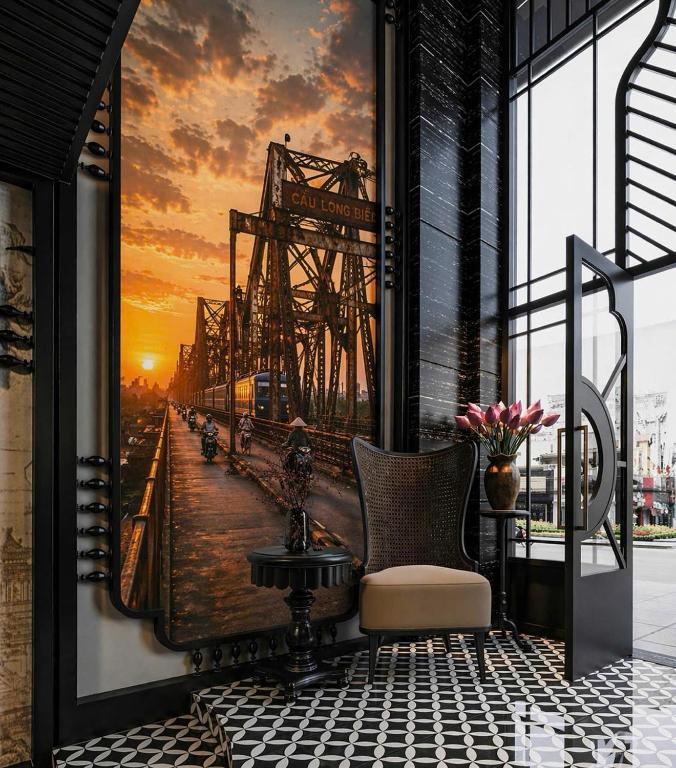 a picture of a train on a bridge at The 39 Lane Hotel Hanoi in Hanoi