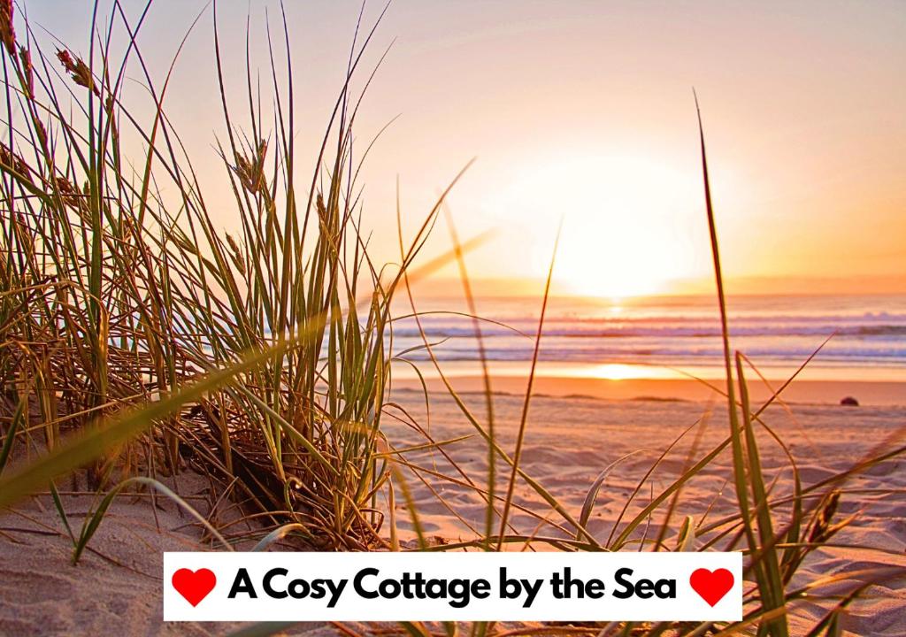 a cozy cottage by the sea by the beach at The Perfect Beach Getaway for Couples in Sutton on Sea