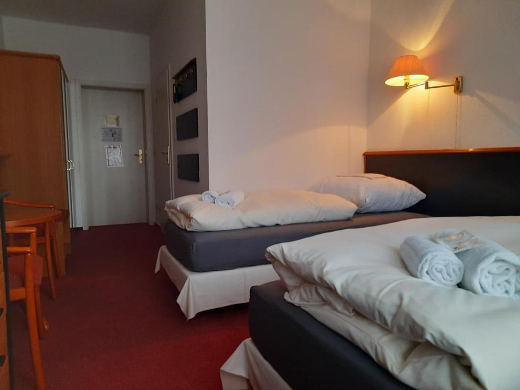 Hotel an der Rennbahn Kostenloses Parken - Dreibettzimmer