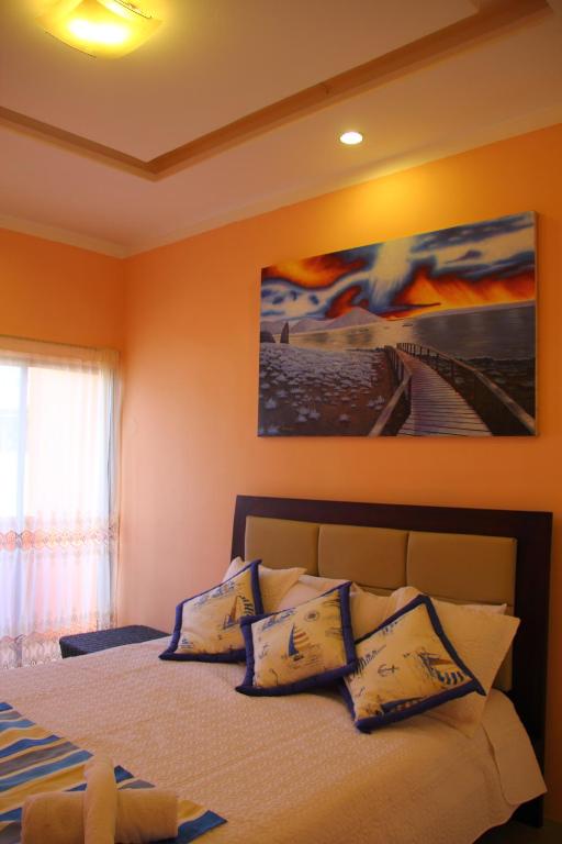 Postel nebo postele na pokoji v ubytování Hostal Duncan