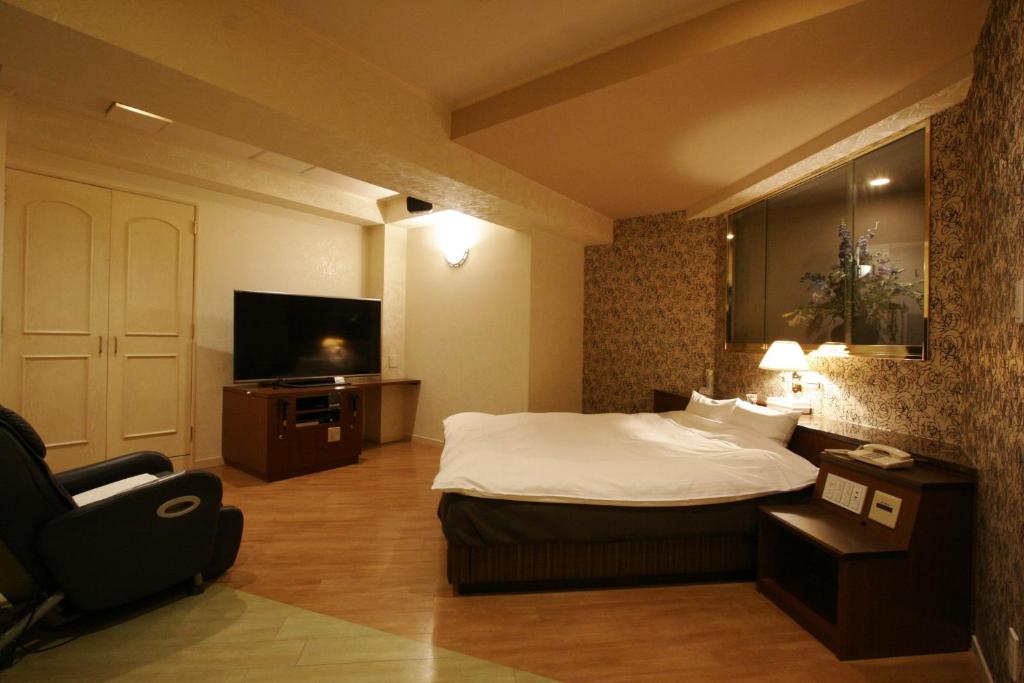 TV a/nebo společenská místnost v ubytování Hotel NOA (Adult Only)