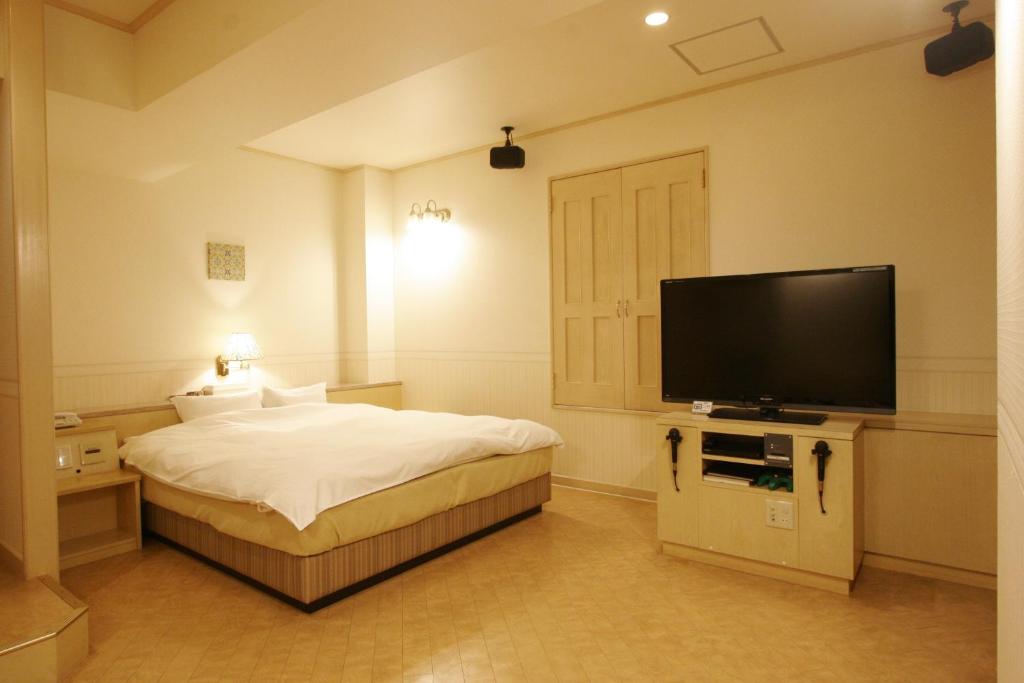 TV a/nebo společenská místnost v ubytování Hotel NOA (Adult Only)