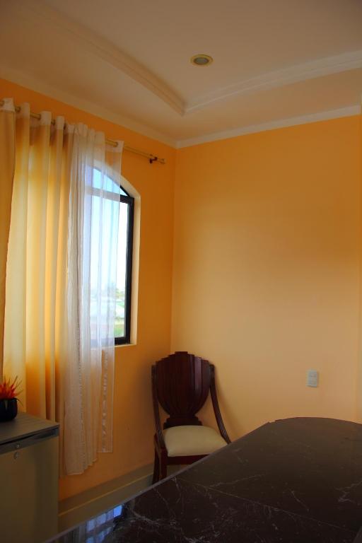 Postel nebo postele na pokoji v ubytování Hostal Duncan