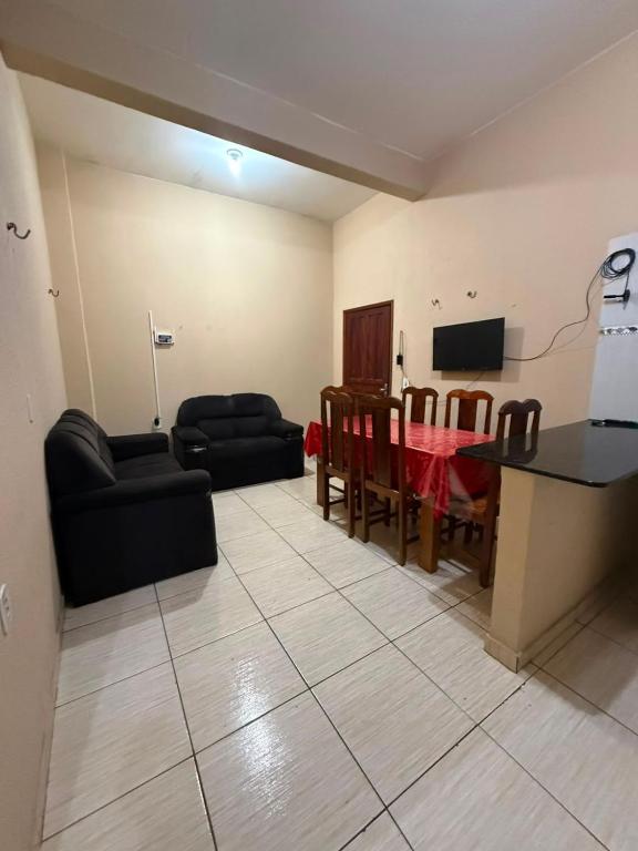 a living room with a couch and a table at APT da Orla 305 in Santarém