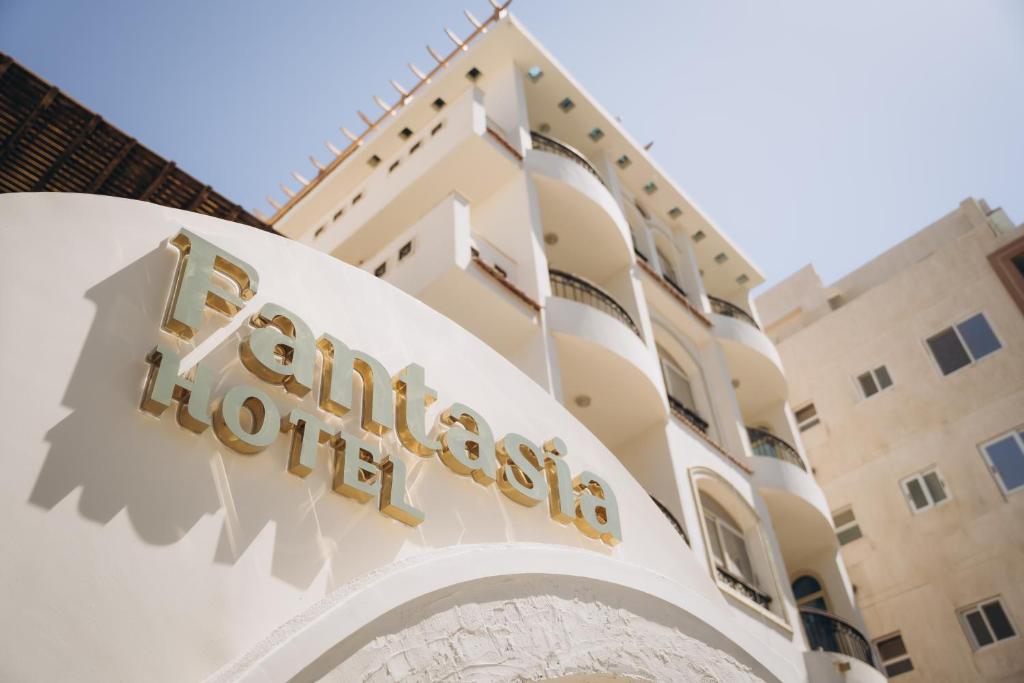 a sign on the front of a hospital building at Fantasia Hotel in Hurghada